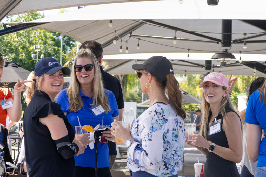 Crowd enjoying the patio on the driving range