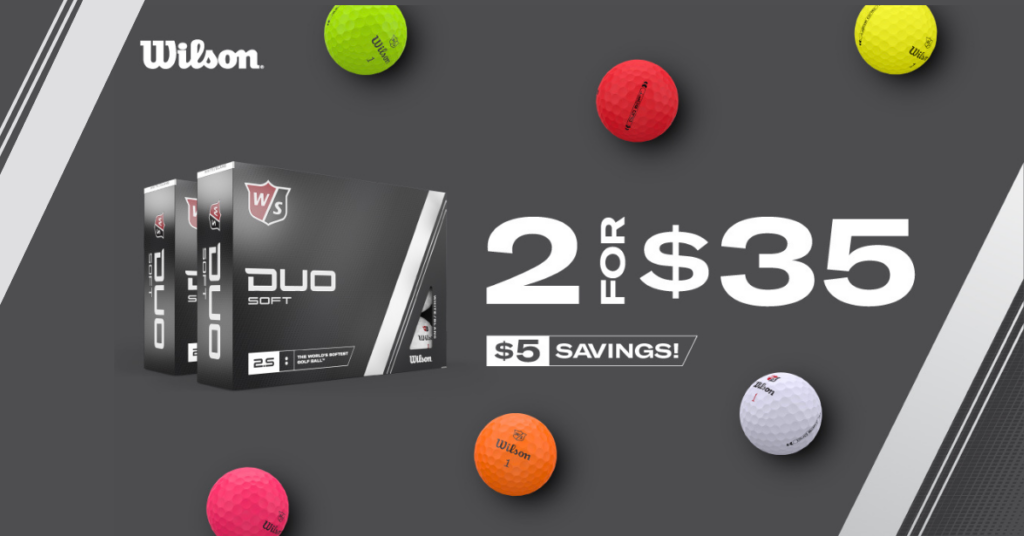 Wilson Duo Boxes and pink, yellow, red, orange, green golf balls on grey background.