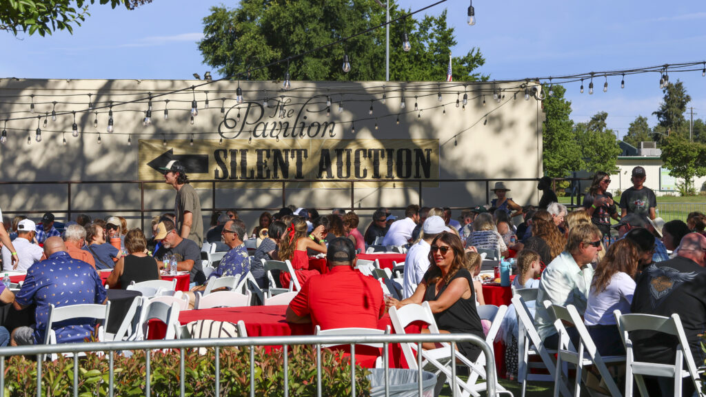 A photo of the Haggin Oaks Pavilion outdoor patio during the Singer/Songwriter dinner.