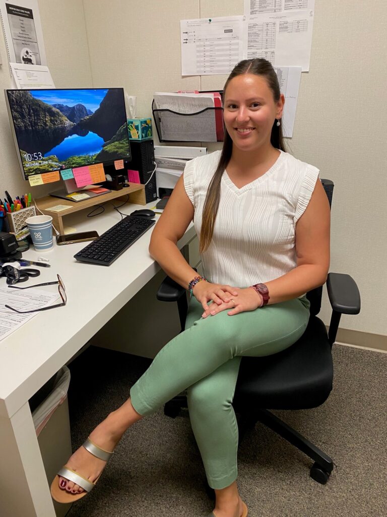 Mayelz Diaz at her desk