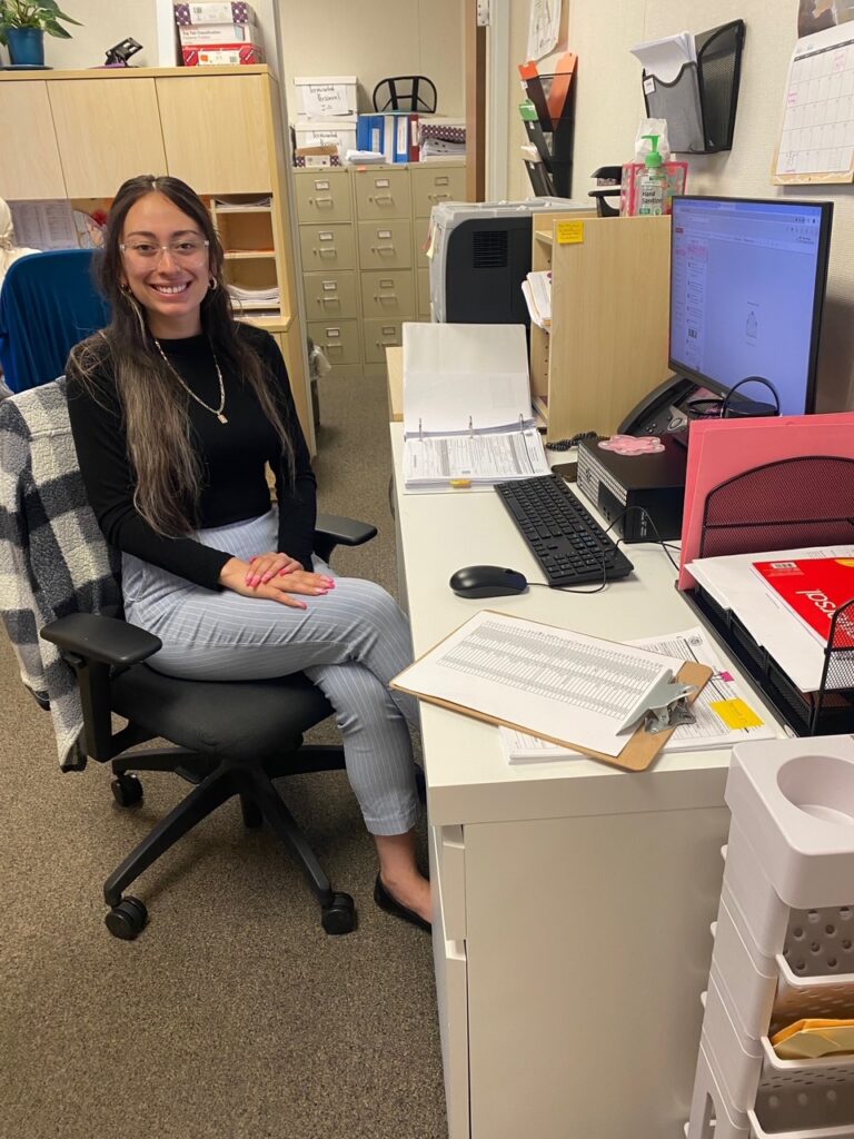 Paulina Estrada at her desk