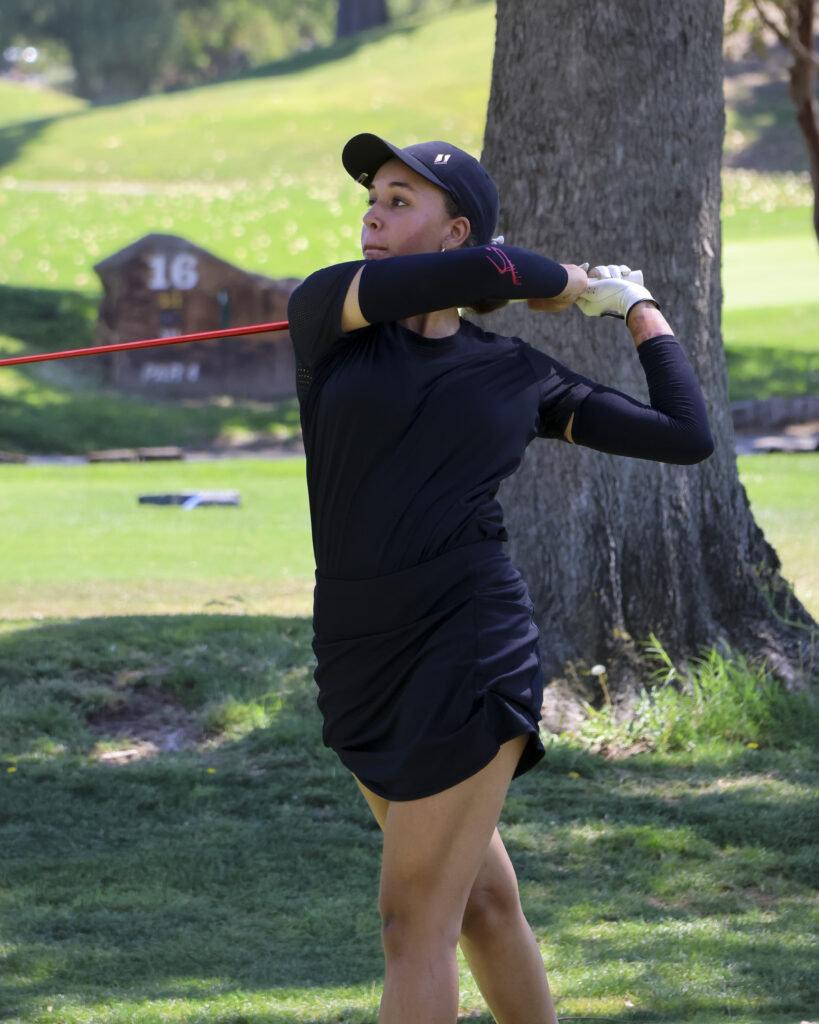 A close-up of Tori James after teeing off on #7.