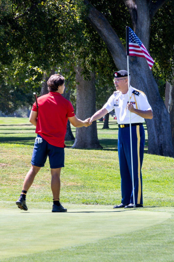 California State Fair Golf Championship golfer shaking a veterans hand