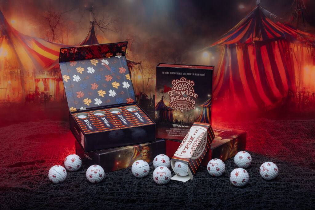 TaylorMade TP5 Nightmare Circus collection of golf balls with circus tents in background