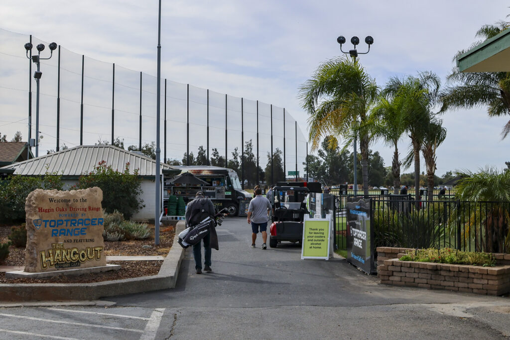 The main entrance to the Haggin Oaks Driving Range. In the distance, the completed range net can be see across the horizon.