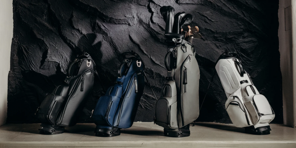 4 golf bags leaning on each other