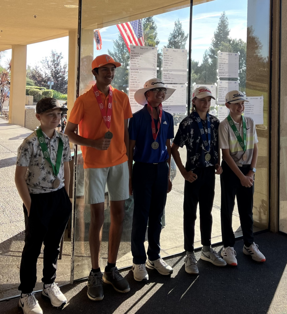 Junior Golfers with medal