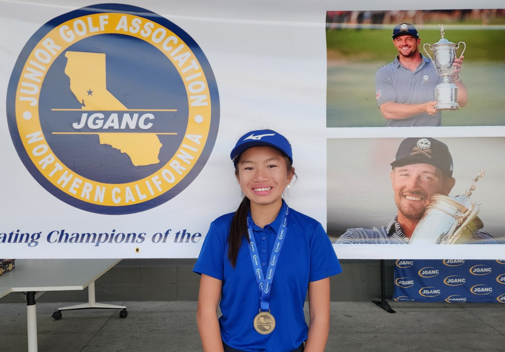 Junior Golfer with medal